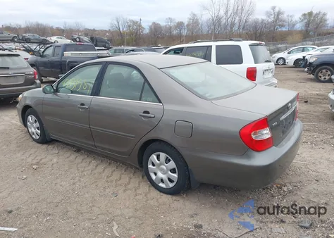 2002 Toyota Camry Le from USA, damaged, VIN 4T1BE32K52U529087